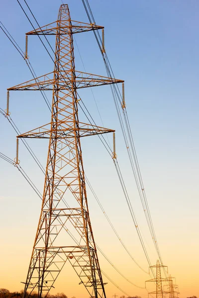 Pylons Eletricidade Rede Nacional Por Sol Nascer Sol Imagem De Stock