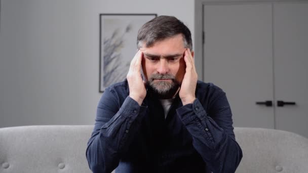 Sad Senior Man Headache Sitting Alone Empty Room — Stock Video