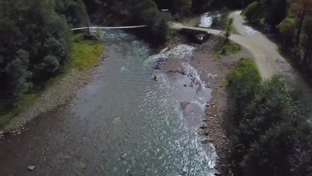 Four Sportsman Begin River Rafting Kayaks — Video Stock
