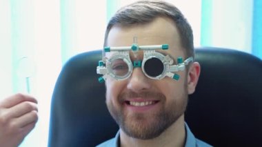 Young male patient wearing special ophthalmic glasses