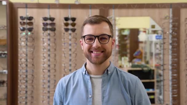 Portrait Young Man New Glasses Optics Shop — Vídeo de stock