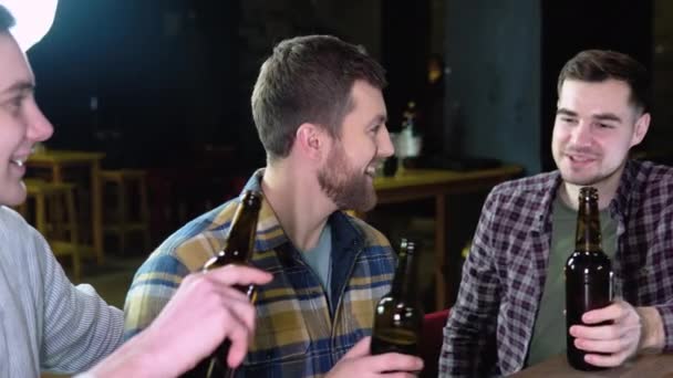 Group Happy Young Men Drinking Cold Draft Beer Chatting Having — Stockvideo