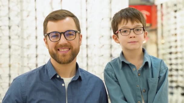 Little Boy His Father Optics Store Ophthalmology Concept — Stockvideo