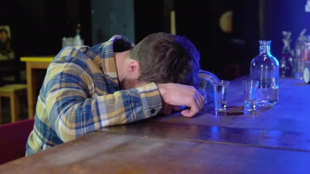 Very Drunk Young Man Lying His Head Table Bar — Stockvideo
