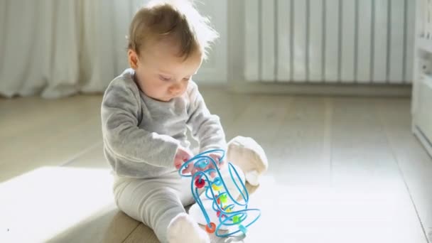 Cute Baby Girl Playing Educational Toy Nursery — Vídeo de Stock