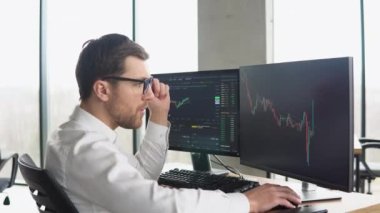 Trader celebrating successful day at the stock market. Bitcoin growth, bullrun.