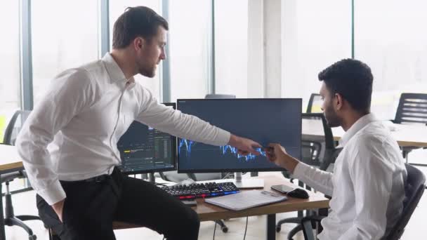 Two Multiracial Investors Brokers Analysing Indexes Online Cryptocurrency Stock Diverse — Video