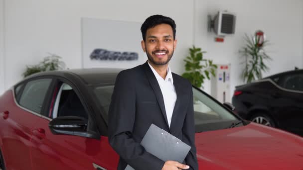 Portrait Successful Indian Male Manager Car Dealership Car Sales — Stockvideo