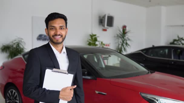 Portrait Successful Indian Male Manager Car Dealership Car Sales — Vídeo de Stock