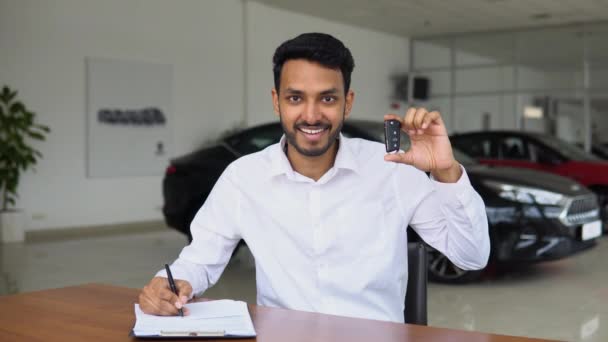 Indian Salesman Making Deal Signs Sales Document Car While Sitting — Stock Video