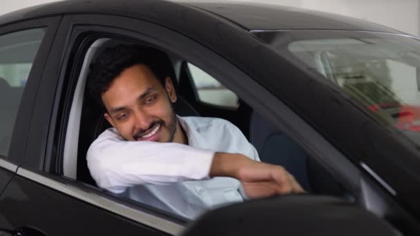 Happy Indian Man Sits New Car Shop Dealership Celebrate Purchase — Stockvideo