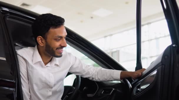 Happy Successful Indian Man Sitting His New Car Auto Showroom — Wideo stockowe