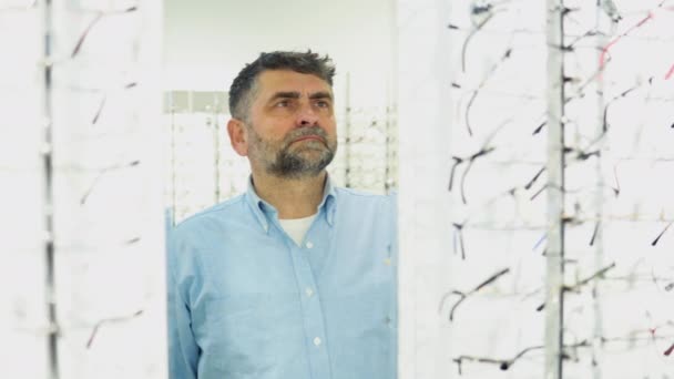 Health Care Eyesight Vision Concept Man Choosing Glasses Optics Store — Video Stock