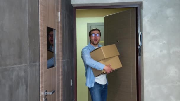 Young Man Moving New Home Freelancer Programmer Having Fun Cardboard — Stock Video
