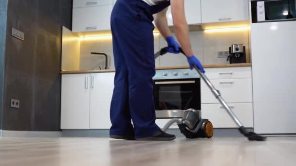 Worker Cleaning Floor Vacuum Cleaner Home — Stock Video