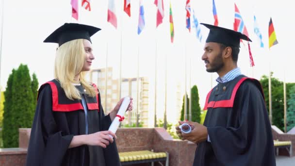 Indian Caucasian Graduates Communicate University Presentation Diplomas — Stock Video