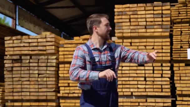 Serious Manager Uniform Giving Commands Workers Timber Warehouse Bearded Man — Stock Video