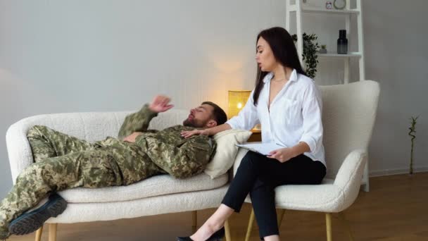 Professional Woman Psychologist Counseling Depressed Soldier — Stock Video
