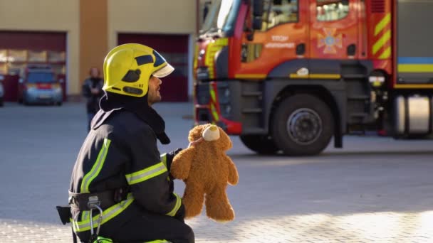 Little Boy Toy Firefighter Protective Uniform Fire Station — Stock Video