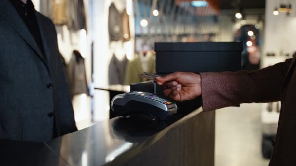 Black Man Clothing Store Making Contactless Payment Credit Card — Stock Video