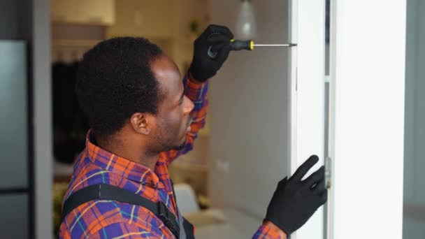 African American Worker Installing Pvc Window Indoors — Stock Video