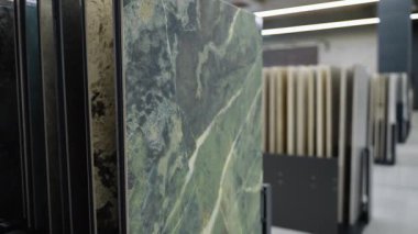 Large size ceramic tile collection in hardware store.