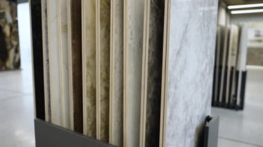 Large size ceramic tile collection in hardware store.