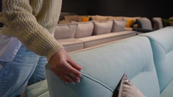 Woman Choosing Sofa Furniture Store — Stock Video