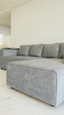 A selection of new sofas displayed in a contemporary furniture store, showcasing modern design, comfort, and versatile seating options for stylish interiors