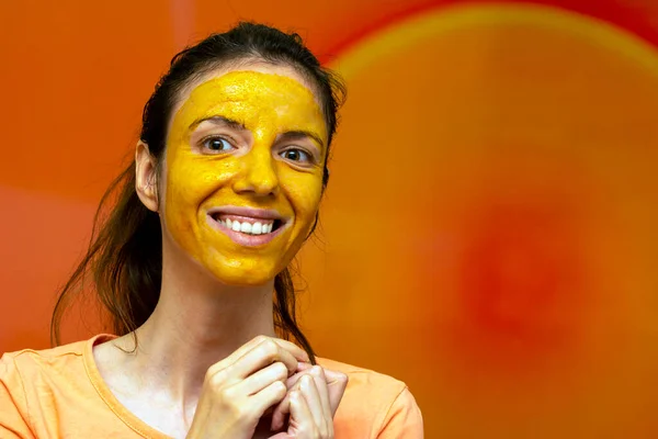 Homemade diy face mask made of turmeric, honey and yoghurt for uneven skin tone, brightening dark spots, reducing fine wrinkles lines for diy beauty