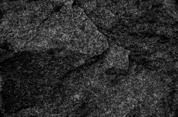 Texture of black white granite stone. Gray stone background with copy space for design. Wide banner. Site title