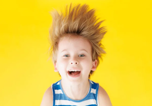 Happy Child Shouting Yellow Paper Background Funny Kid Hanging Upside — Stock Photo, Image