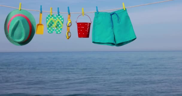 Beach Objects Hanging Blue Sky Sea Slow Motion — Stock Video