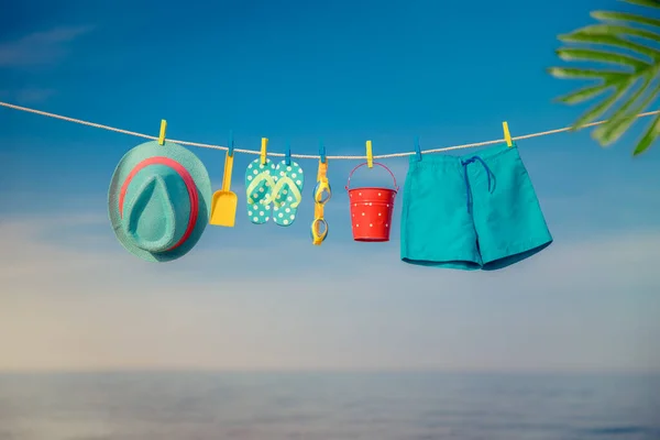 Beach Hat Flip Flops Goggles Hanging Clothesline Things Vacation Blue — Stock Photo, Image
