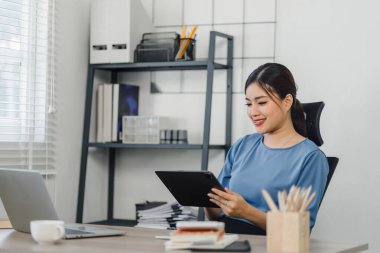 Analyst woman working with information database to analyze marketing and sales data. Business analytics dashboard with charts, metrics, and KPIs concept