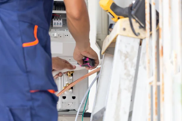 Technician Man Installing Air Conditioning Client House Young Repairman Fixing — Stock Photo, Image