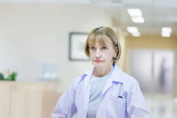 Portrait of Female doctor posing and standing at a hospital, Medical healthcare, and doctor service