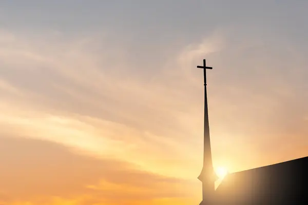배경으로 교회에 십자가의 실루엣 스톡 사진