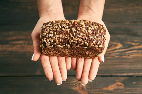 Loaf Fresh Made Rye Multigrain Bread Woman Hands Wooden Table — Stock Photo, Image
