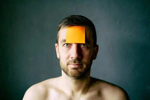Closeup Portrait Half Naked Man Sticky Note His Forehead Gray Royalty Free Stock Photos