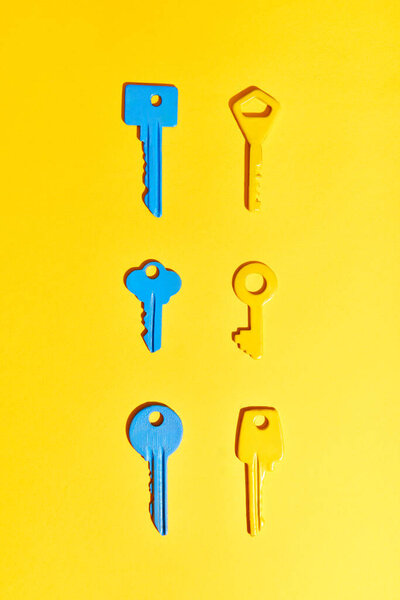 Various Colorful Keys Vibrant Yellow Background Flat Lay Royalty Free Stock Images