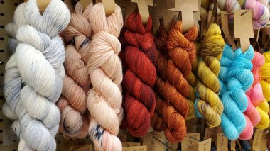 Braids of colorful crocheting threads on display