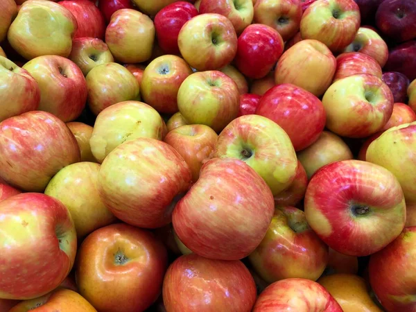 Medium close up shot of a bushel of red apples