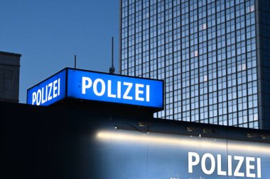 Berlin, Germany - November 2, 2022: Inscription Polizei (Police) on Police department on Alexanderplatz in Berlin. clipart