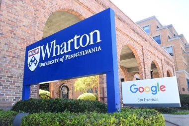 San Francisco, CA, USA - July 26, 2023: The signs of Wharton San Francisco - University of Pennsylvania and Google San Francisco. clipart