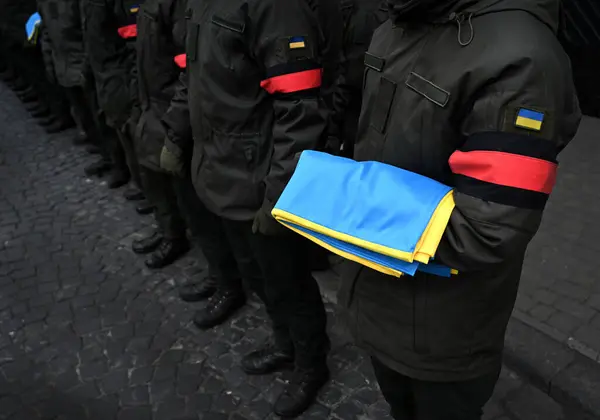 Ukrainian soldiers stand during funerals ceremony. memorial service