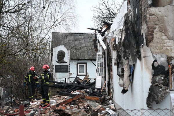 Lviv, Ukraine - January 1, 2024: Ukrainian firefighters inspect the destroyed building Roman Shukhevych Museum after a Russian drone attack in Lviv. 