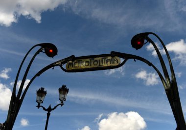 Paris Metropolitain entrance sign. Paris Metropolitain entrance in Paris, France clipart