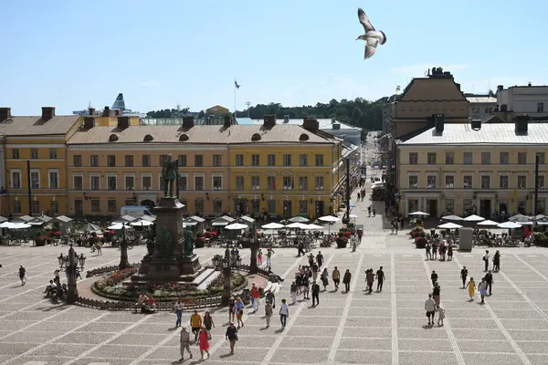 stock image Helsinki, Finland - July 25, 2024: A people on the  Senate Square (Senaatintori) in Helsinki.