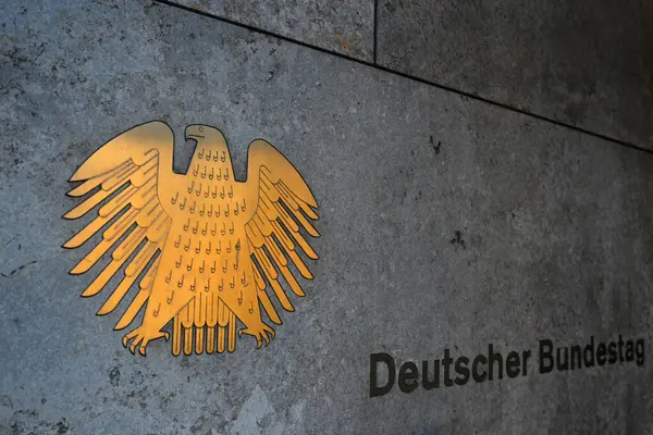 stock image Berlin, Germany - August 2, 2024: The German Bundestag (Deutscher Bundestag) logo on German Bundestag building